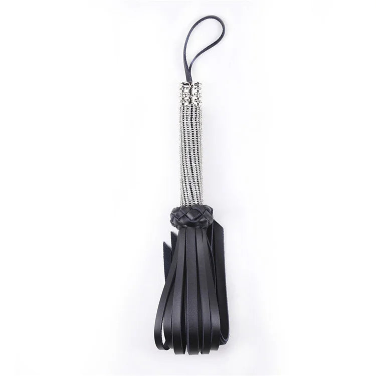 Side profile of rhinestone leather flogger