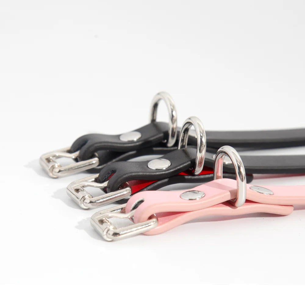 Multiple color minimalist bell leather collars adjustment detail view