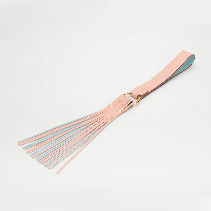 pink strap-style BDSM flogger full display