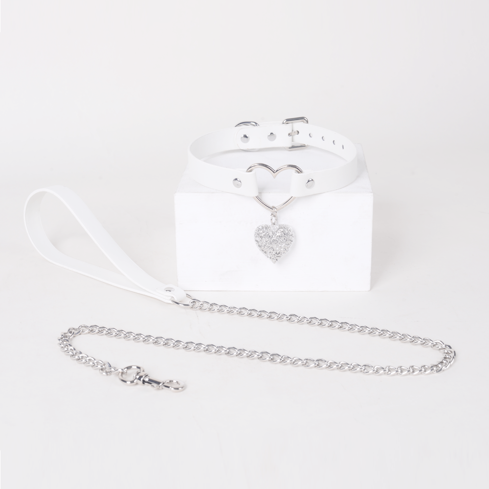 White leather collar with silver heart bell and leash