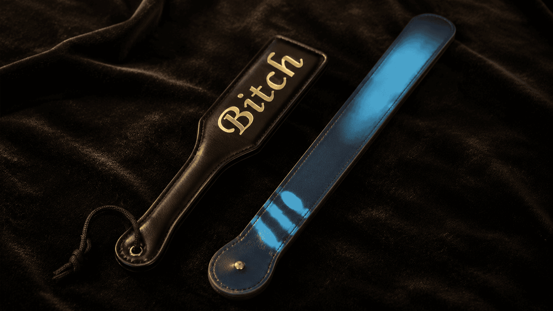 expensive quality leather paddle beside budget paddle on dark surface showing price comparison test