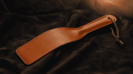 soft flexible leather paddle on light surface suggesting gentle approachable beginning