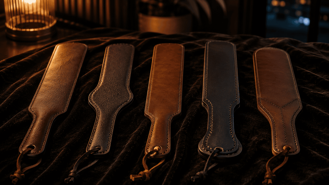 ive leather paddles arranged on dark surface tested for quiet apartment impact play