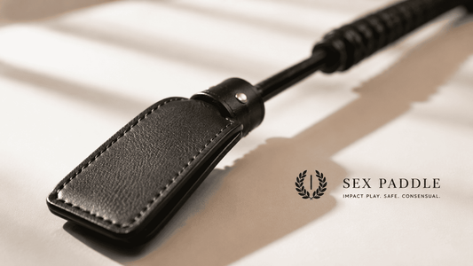 close up of leather crop tip with textured flap in studio lighting