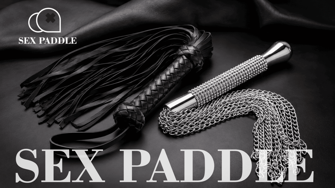 metal chain flogger and black leather flogger in moody studio lighting