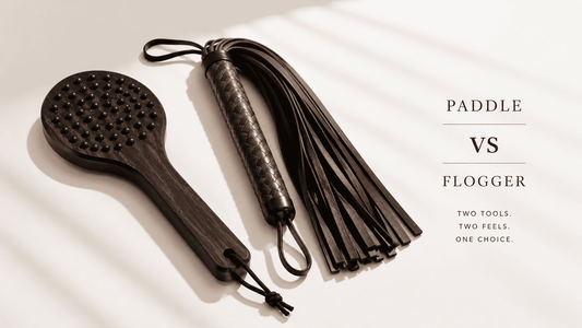 wooden paddle and leather flogger side by side comparison