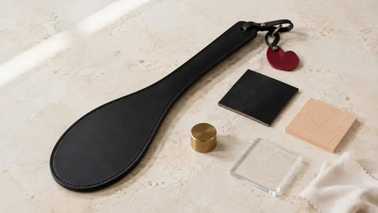 Couple compares an oval leather paddle and material samples