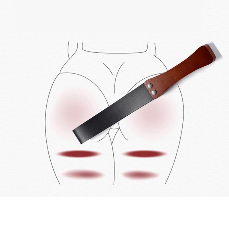 Spanking paddle sex play appeal psychology