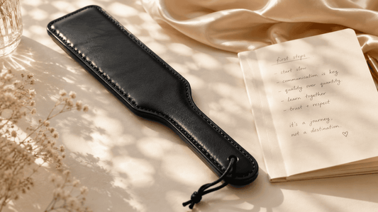 first spanking paddle on dark surface with handwritten notes showing honest beginner account 