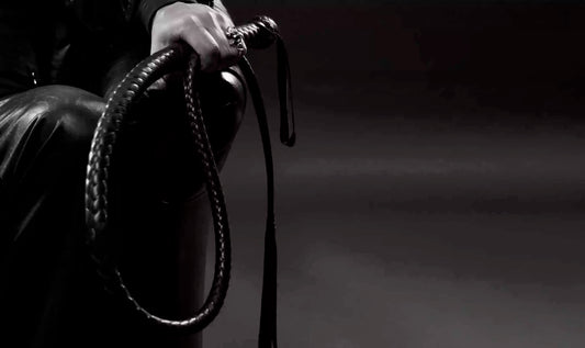BDSM flogger collection showing leather suede and rubber floggers for impact play comparison