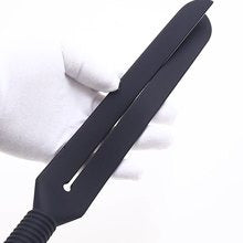 Pala de silicona resistente con forma de tenedor para azotes — Silicona negra densa, punta bifurcada