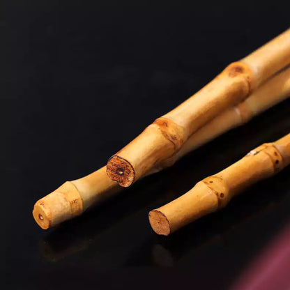 Close-up of tip end on bamboo segment discipline cane