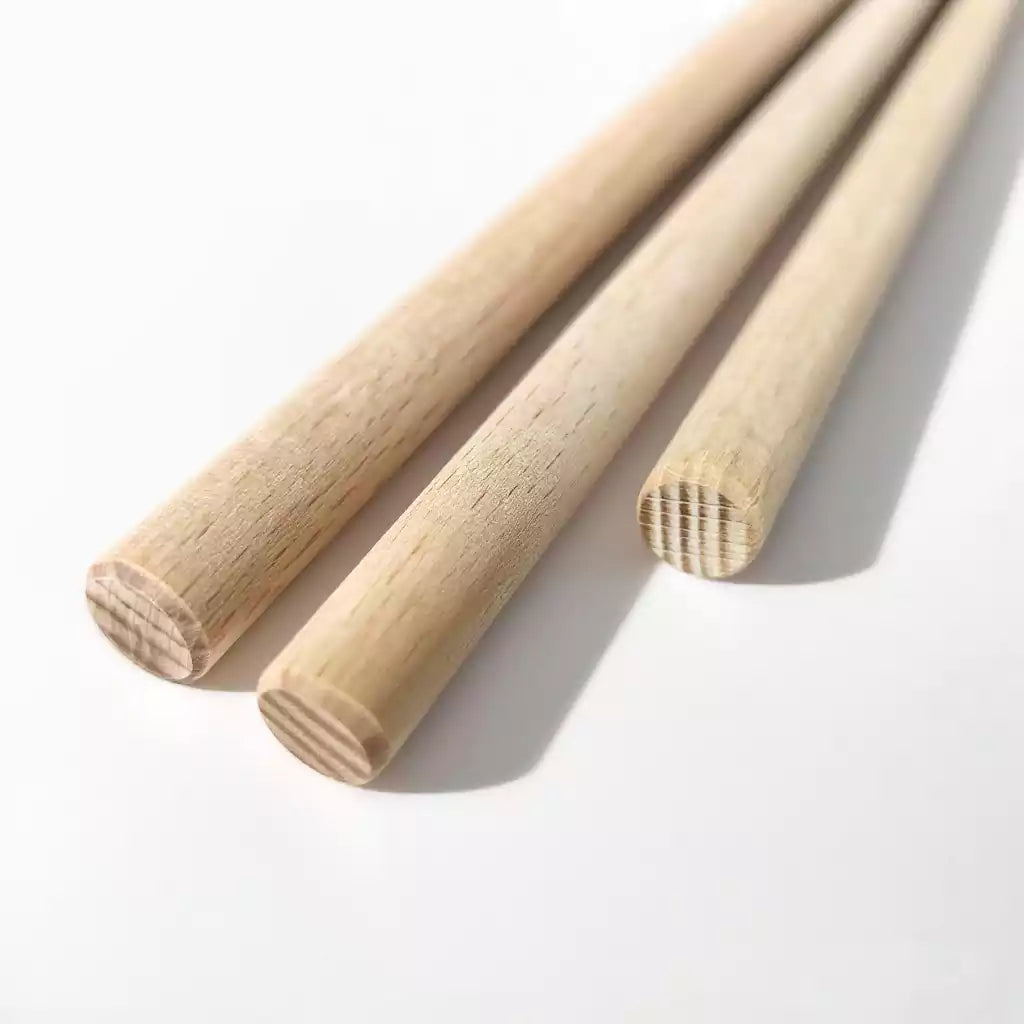 Close-up of rounded tip on beechwood discipline rod