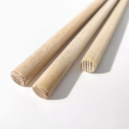 Close-up of rounded tip on beechwood discipline rod