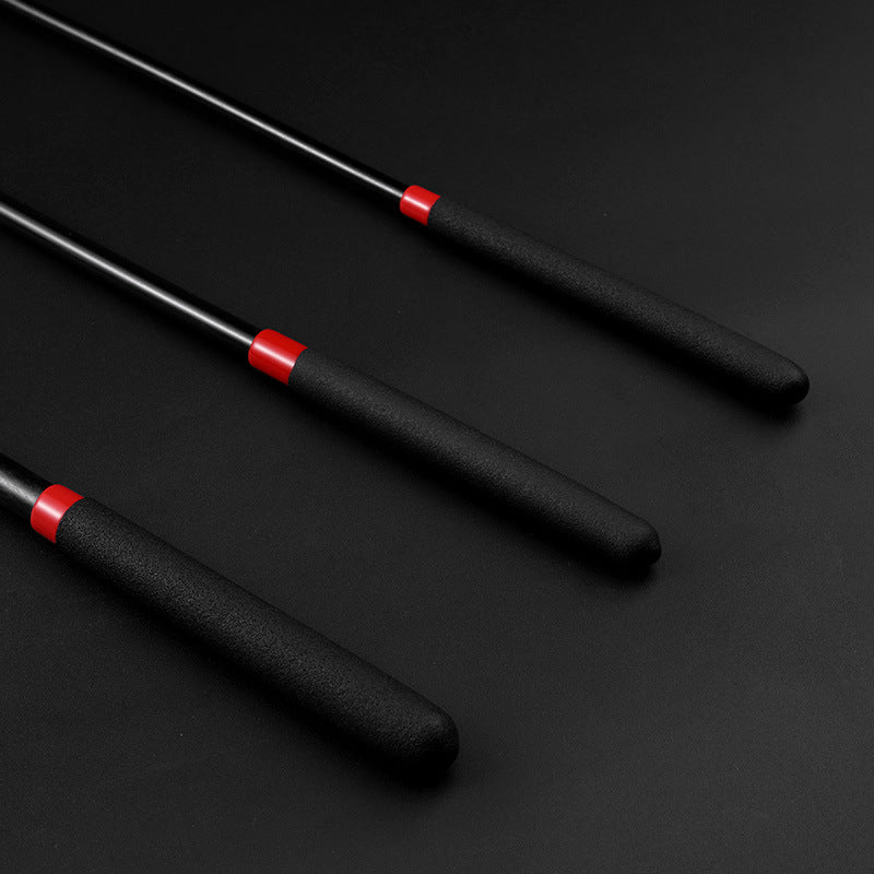 Close-up of non-slip handle on black acrylic BDSM discipline cane