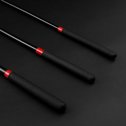 Close-up of non-slip handle on black acrylic BDSM discipline cane