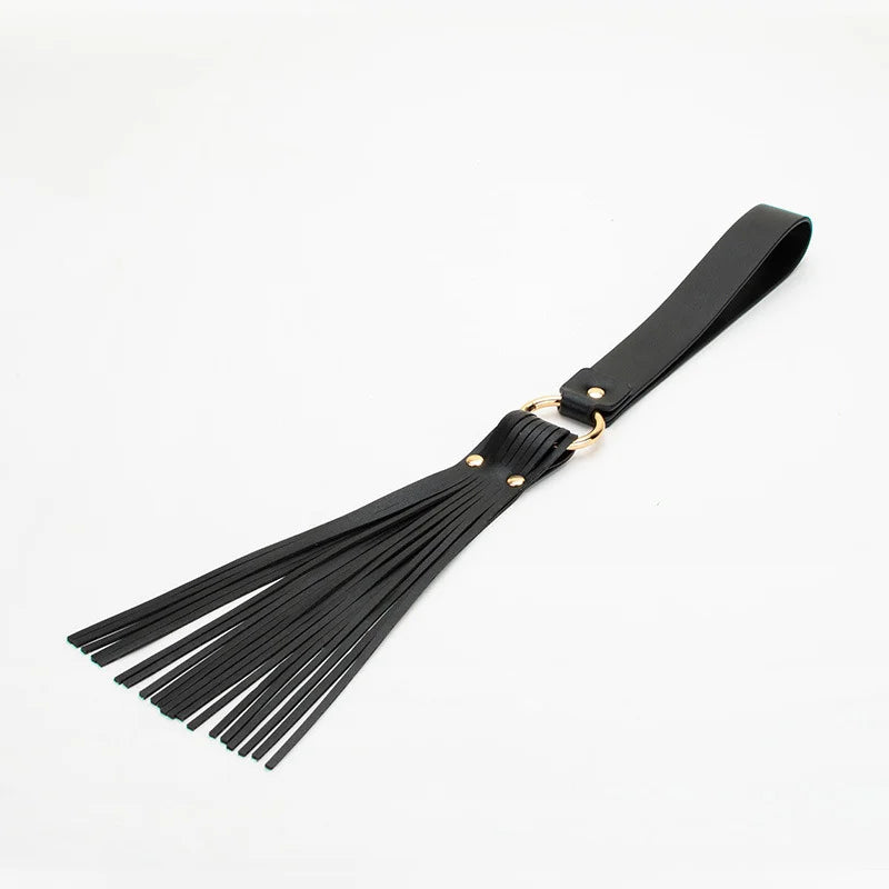 black belt-style BDSM flogger full view