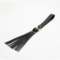 black belt-style BDSM flogger full view