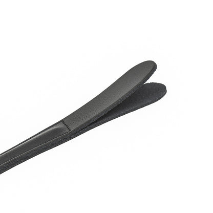 Close-up of dual-layer cowhide leather striking tip on black riding crop