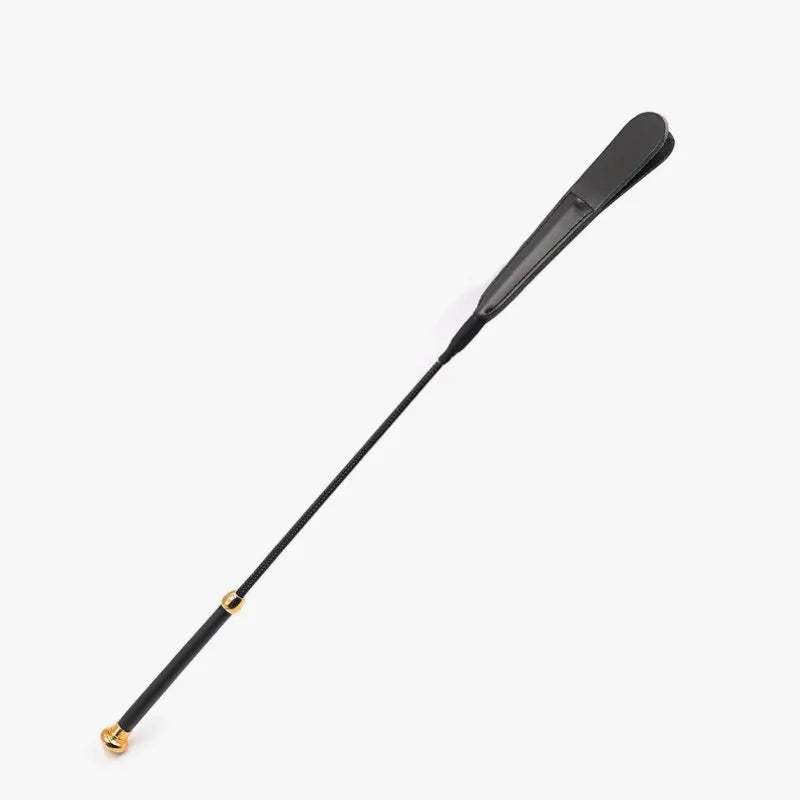 Black cowhide riding crop with gold hardware full view 25.2 inches