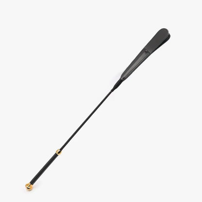Black cowhide riding crop with gold hardware full view 25.2 inches