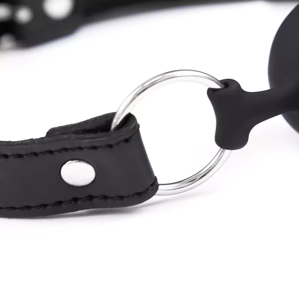 Additional close-up of the black dual-mode phallic ball gag structure
