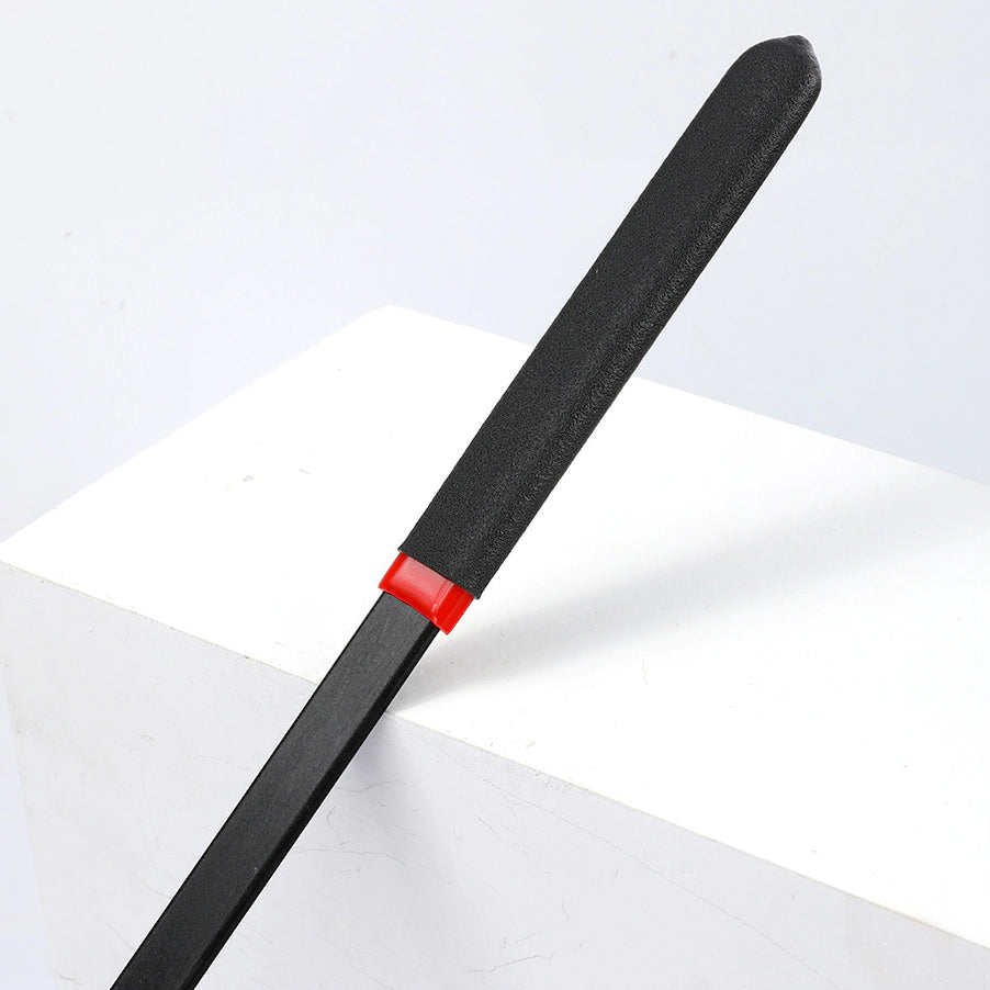 Close-up detail of the black flat cane