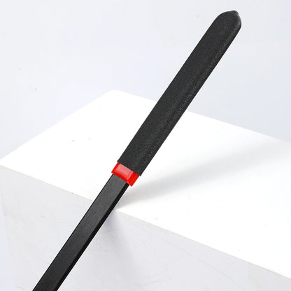 Close-up detail of the black flat cane