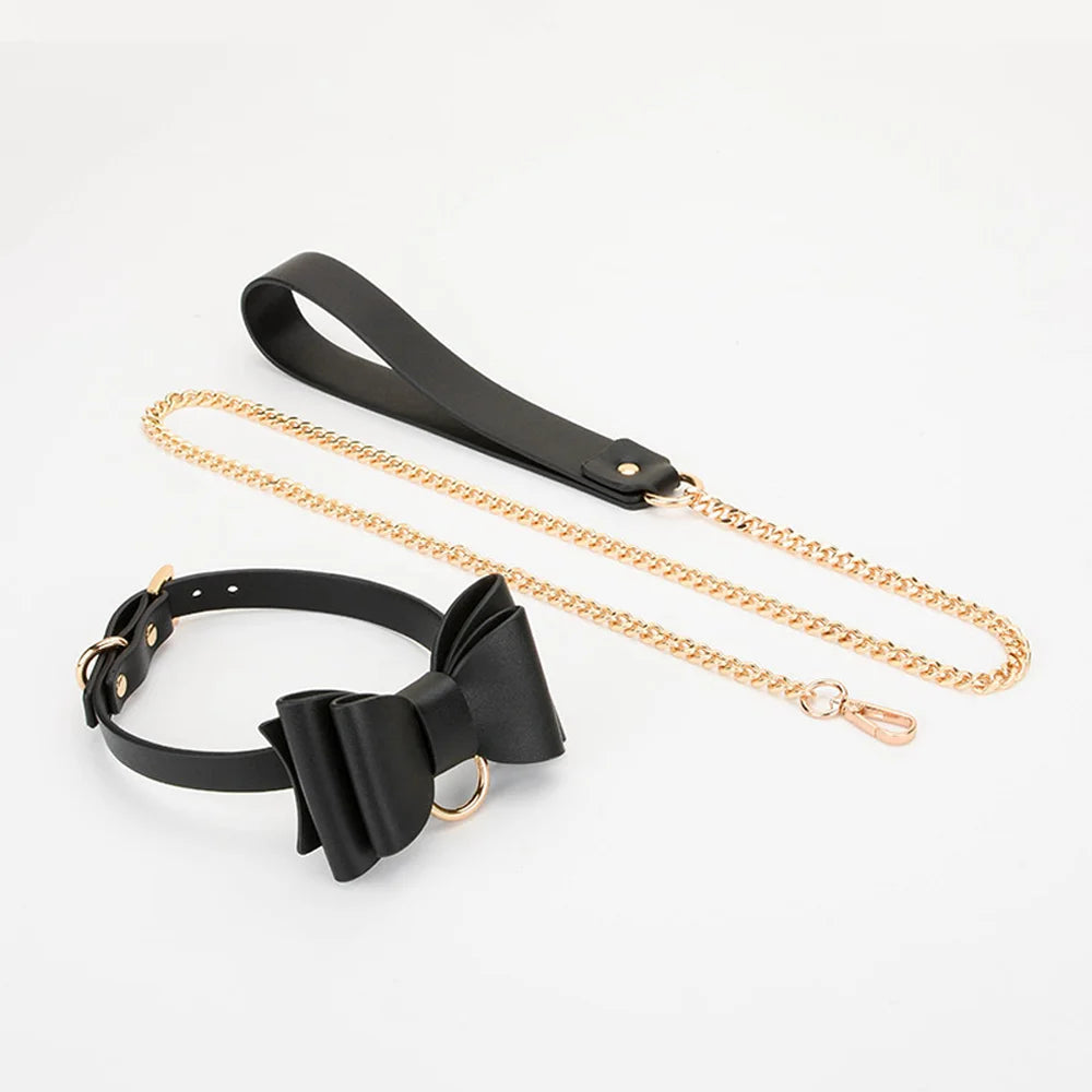 All black glossy bow collar with leash full view
