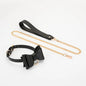 All black glossy bow collar with leash full view