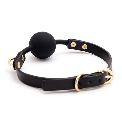 Minimalist gold-tone ball gag angled full view