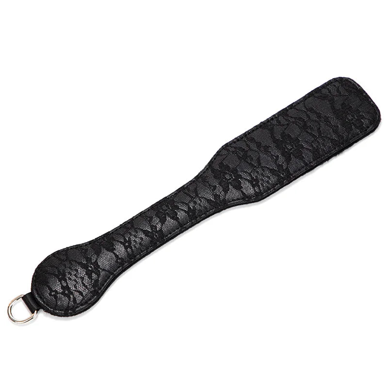 Black lace mini spanking paddle on white background full view