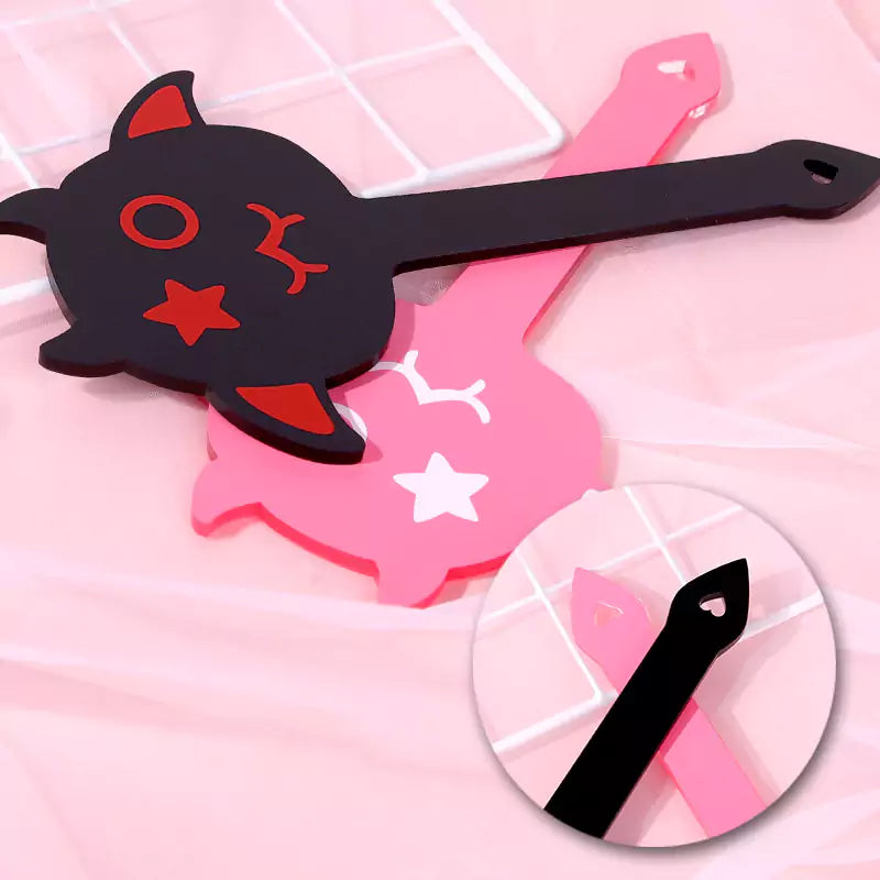 Handle detail of black and pink Devil Acrylic Spanking Paddles