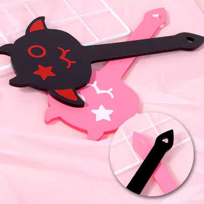 Handle detail of black and pink Devil Acrylic Spanking Paddles