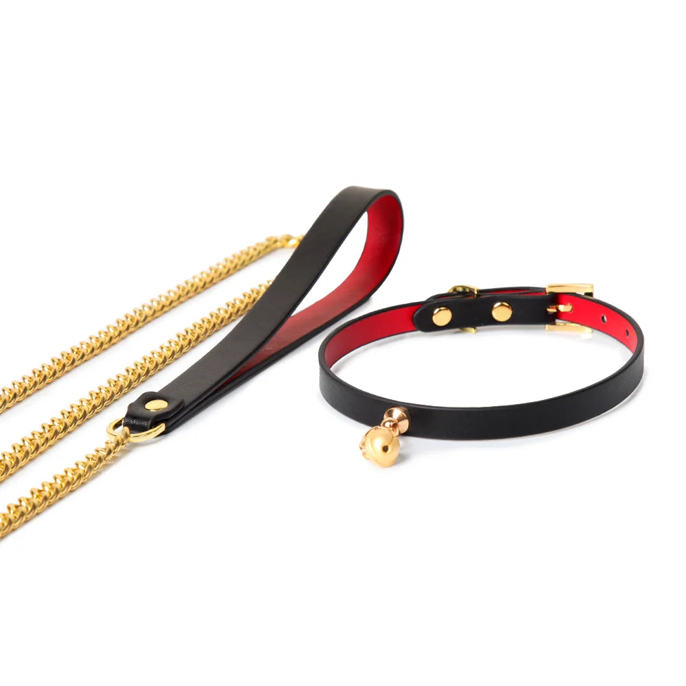 black and red leather BDSM collar with bronze bell and chain attachment