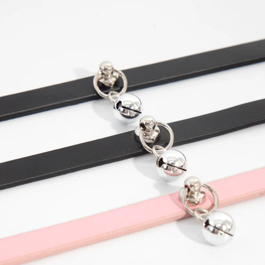 Black red and pink minimalist bell leather collars close detail view