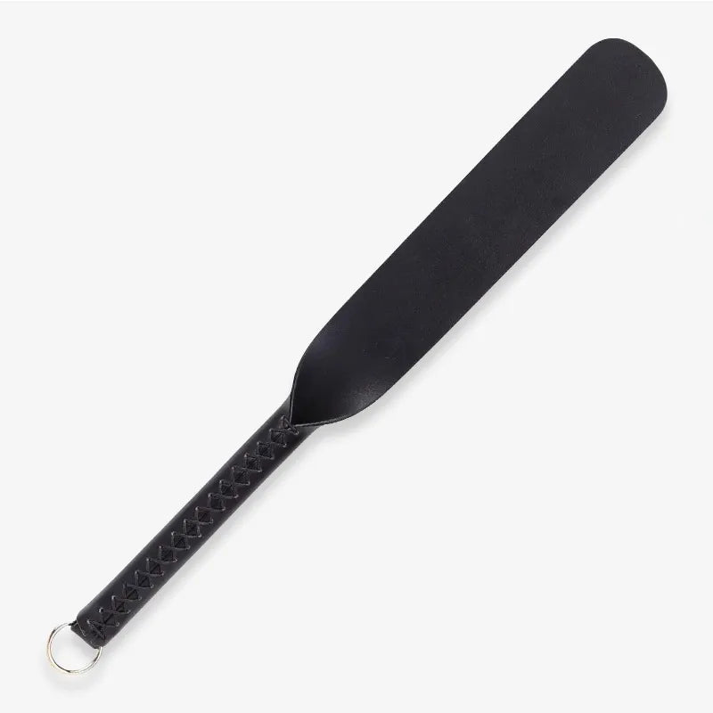 Black oval silicone spanking paddle full view