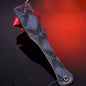 Black dual-color snake pattern hand spanker paddle full view
