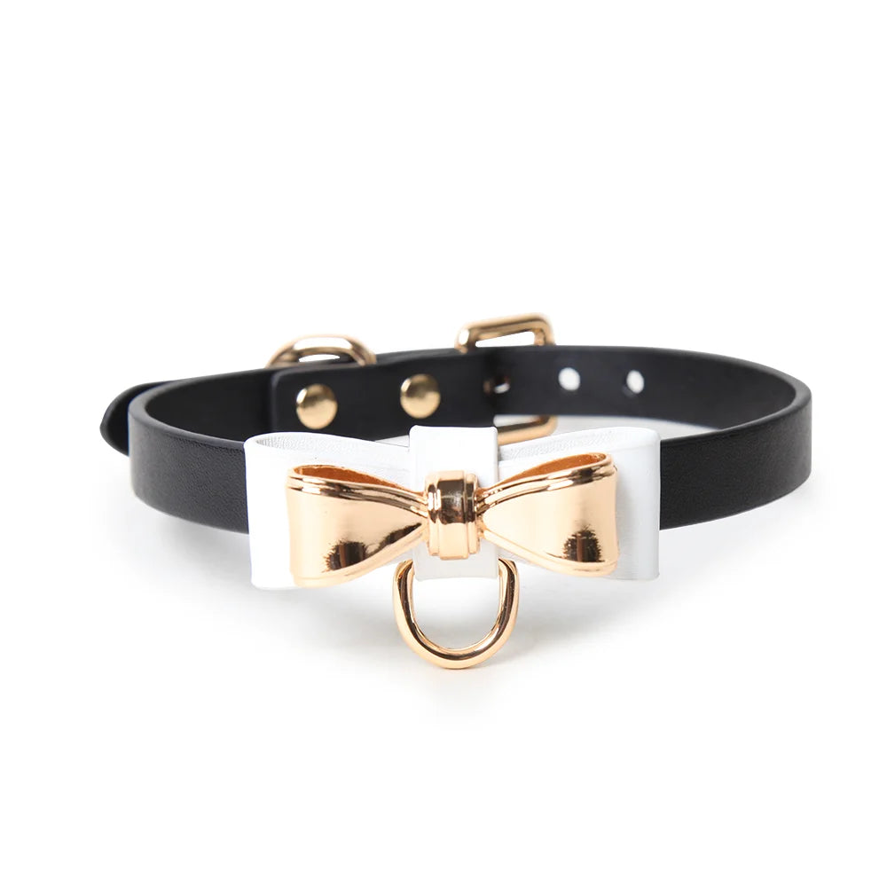 Black strap collar with white bow and gold accent no leash