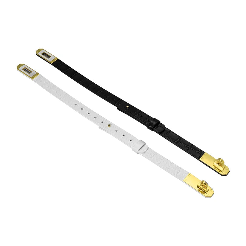 Flat lay of black and white genuine leather collars without tether