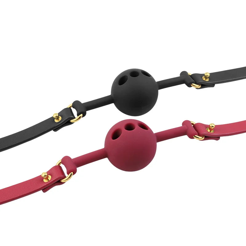Black and red breathable silicone ball gags with air holes shown together