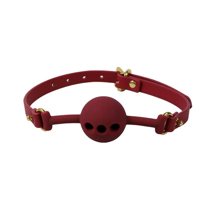 Red breathable silicone ball gag with air holes shown in a front view