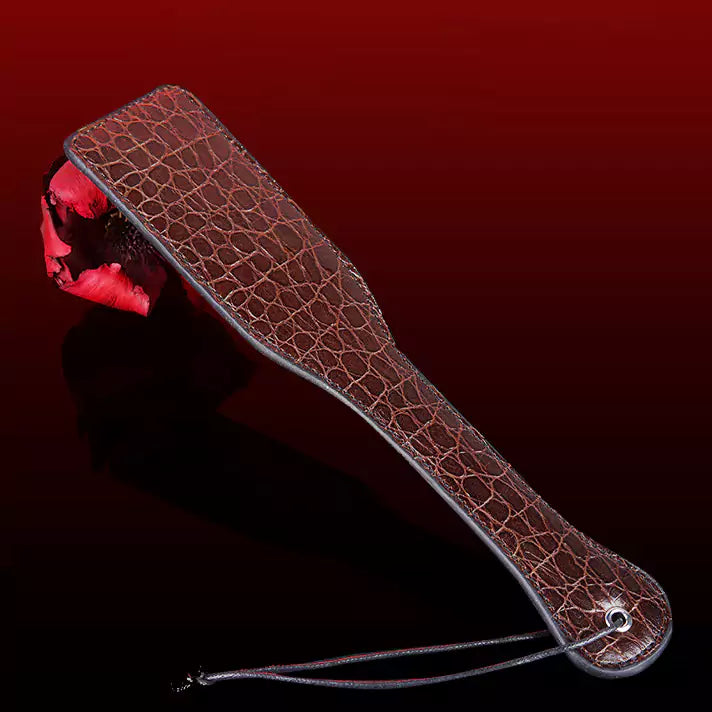 Brown dual-color snake pattern hand spanker paddle full view