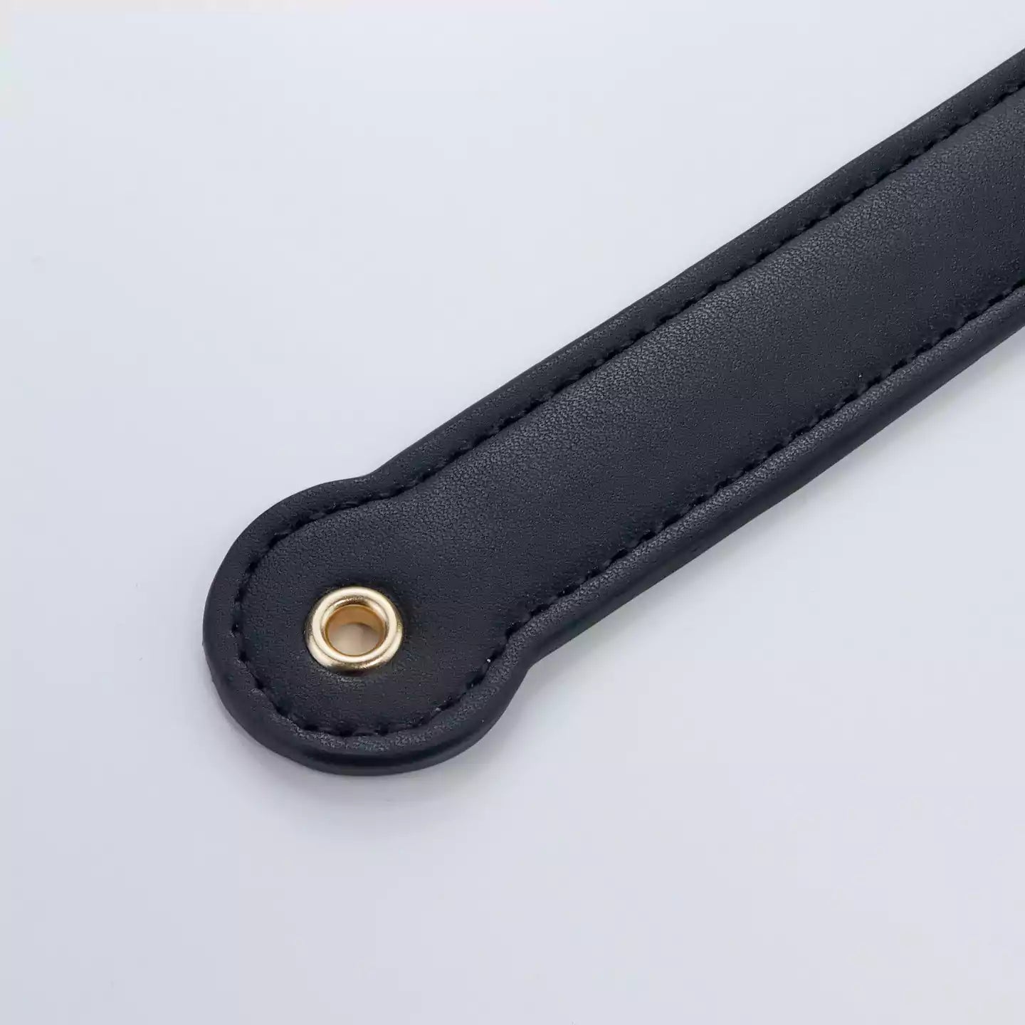 PU leather handle detail on cat paw silicone paddle