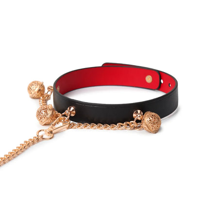 Chain bell leather collar with leash in expressive restraint setting