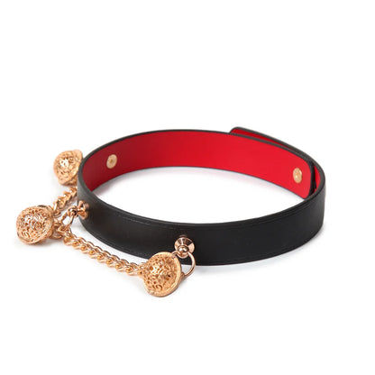 Right side detail of leather collar with hollow bell