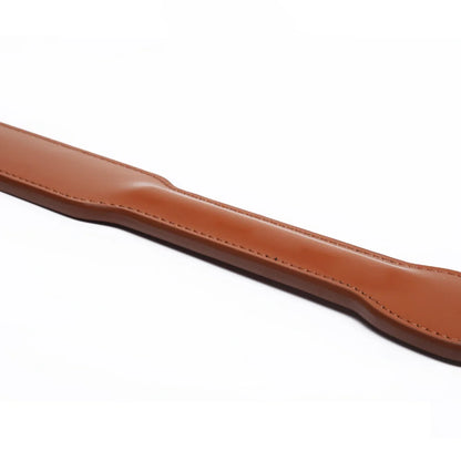 Brown leather paddle raised-grip handle detail