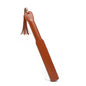 Brown leather paddle with tassel on white background