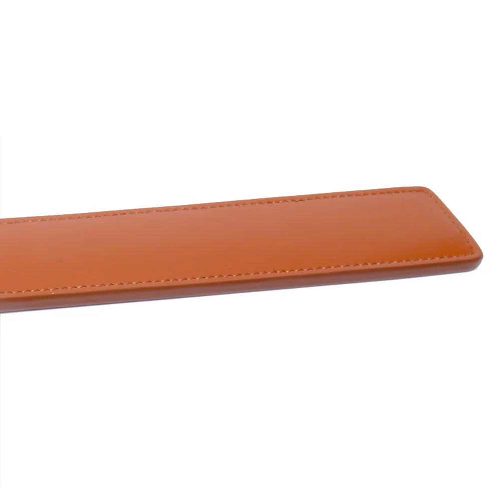 Close-up of genuine cowhide strike surface on paddle