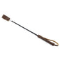 Classic brown leather riding crop on white background